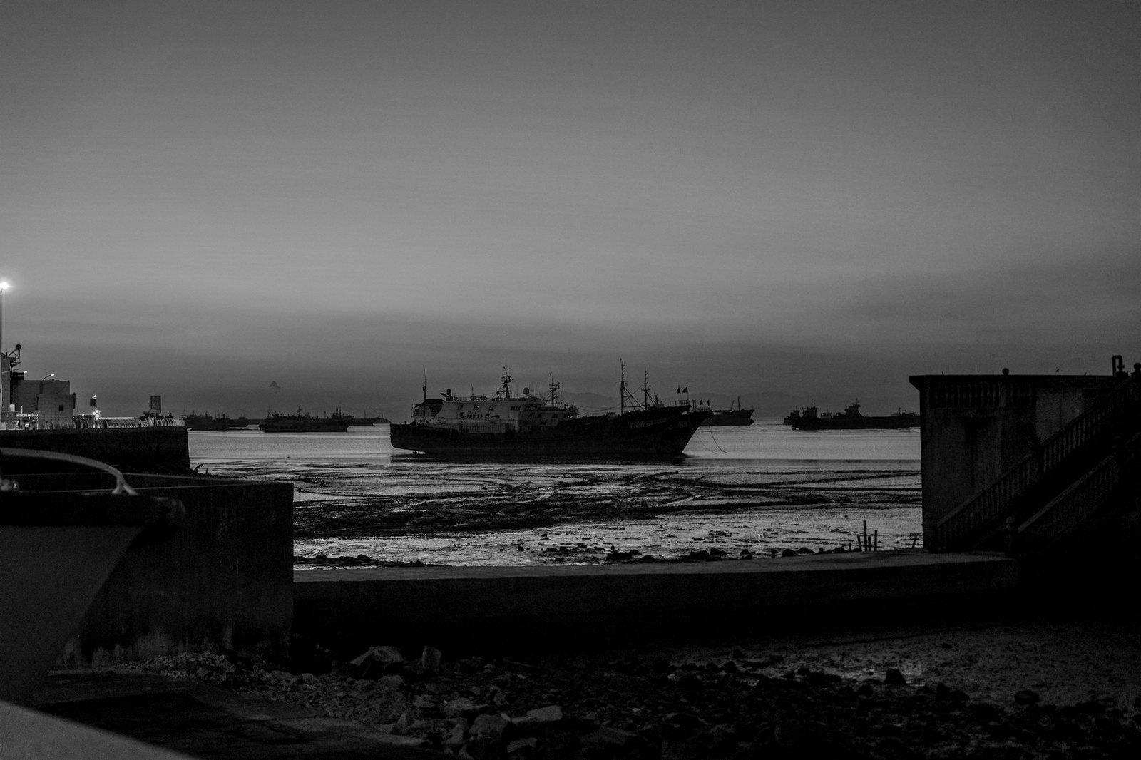 Wrongful ship arrest Bangladesh — bulk carrier waiting at an outer anchorage under an Admiralty Court arrest order